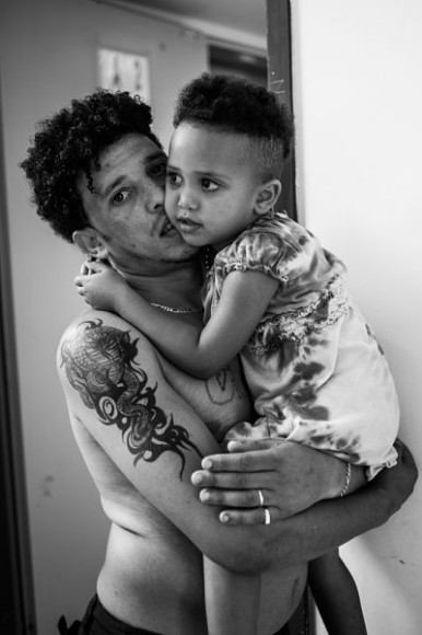 an Eritrean man with his daughter